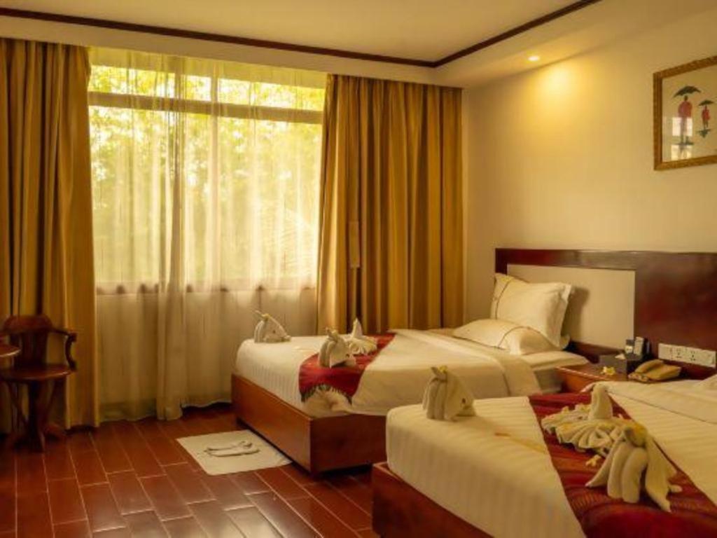 Xishuangbanna Hotel Managed By Xandria Hotel Luang Prabang Exterior photo